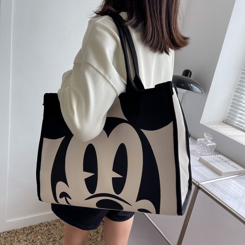 2025S Fashion Designer Cartoon Printed New Canvas Women S Fashion Shoulder Bag Commuting Tote Bag