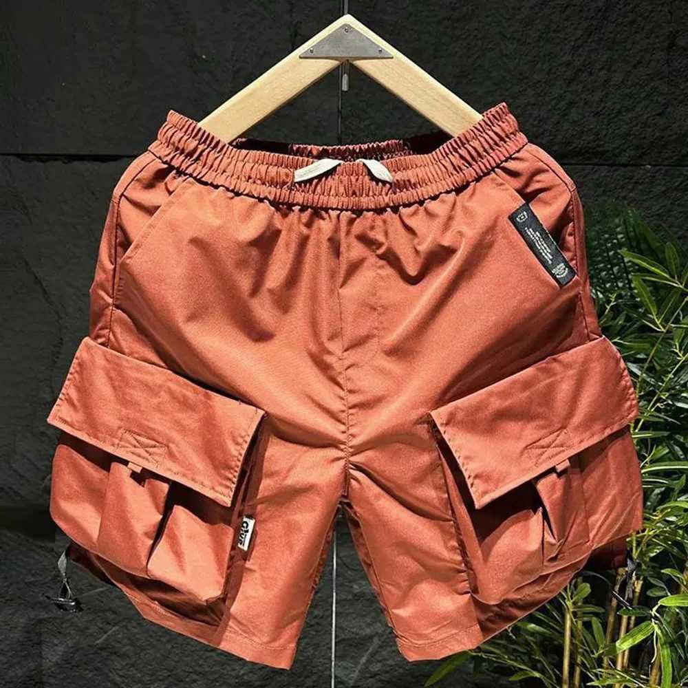 Mens work shorts multi pocket quick drying breathable beach pants classic and comfortable youthful sports shorts fashionable summer 2024 X250324