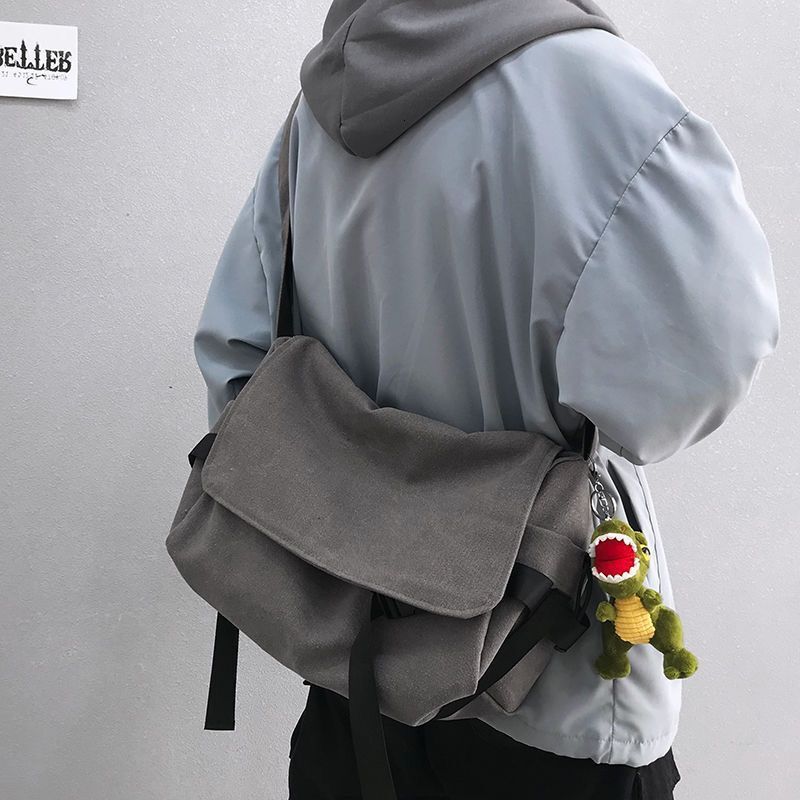 2025S Fashion Designer Korean Version Minimalist Ins Cool Canvas Men S And Women S Trendy Single Shoulder Crossbody Bag New Handbag