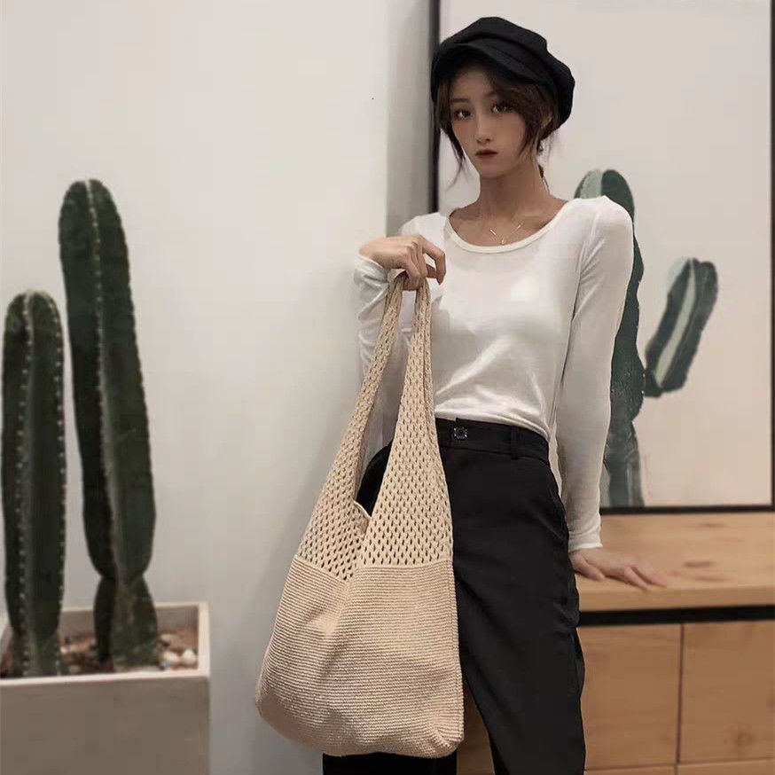 2025S Fashion Designer INS Style Spring Summer New Hollow Out Knitted Handbag Small Single Shoulder Women S Versatile Wool Weaving Oblique Straddle Ba