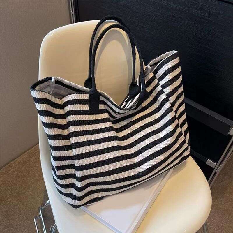 2025S Designer S New Model Commuting Canvas Women S Large Capacity Bag New Striped Single Shoulder Mommy Tote Bag