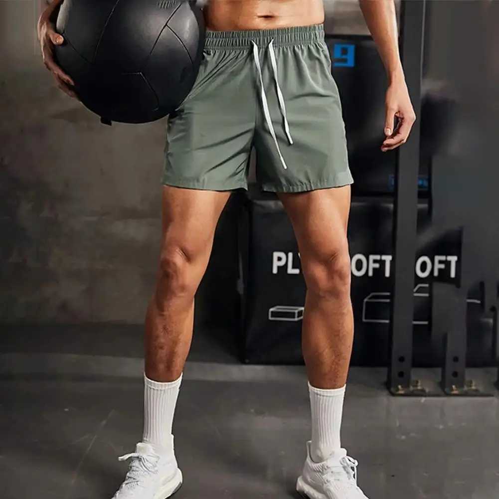 2024 new summer mens shorts quick drying nylon fitness training running shorts mens plus size sports shorts W250324