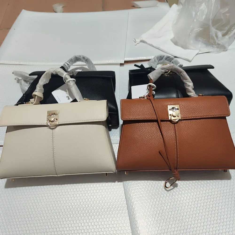 Vintage leather bag light niche small square bag French ten letter handbag Communicating womens bag designer bag Z250324