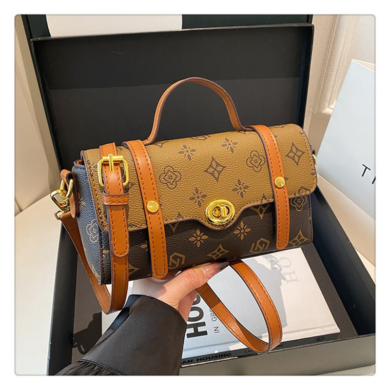 Free shipping 2025 new designer bag Fashion commute Printed temperament single shoulder crossbody bag Handheld for women