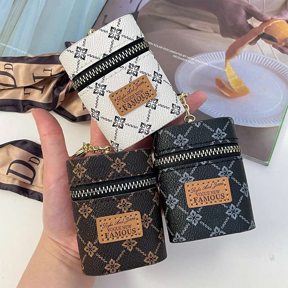 2025 New Designer Bag Women's Light Luxury Leather Oval Mouth Red Envelope Keychain Charm Ribbon Coin Wallet Pendant Girl Keychain Cute Keychain 