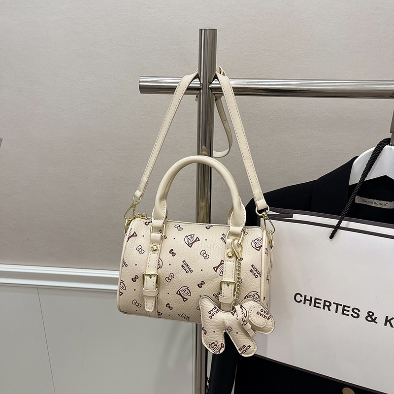 Free shipping 2025 new designer bag, fashionable commuting dog decoration pillow bag, hand-held single shoulder diagonal cross bag