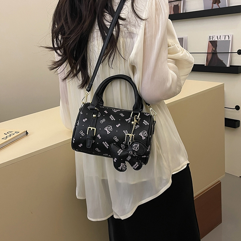 Free shipping 2025 new designer bag, fashionable commuting dog decoration pillow bag, hand-held single shoulder diagonal cross bag