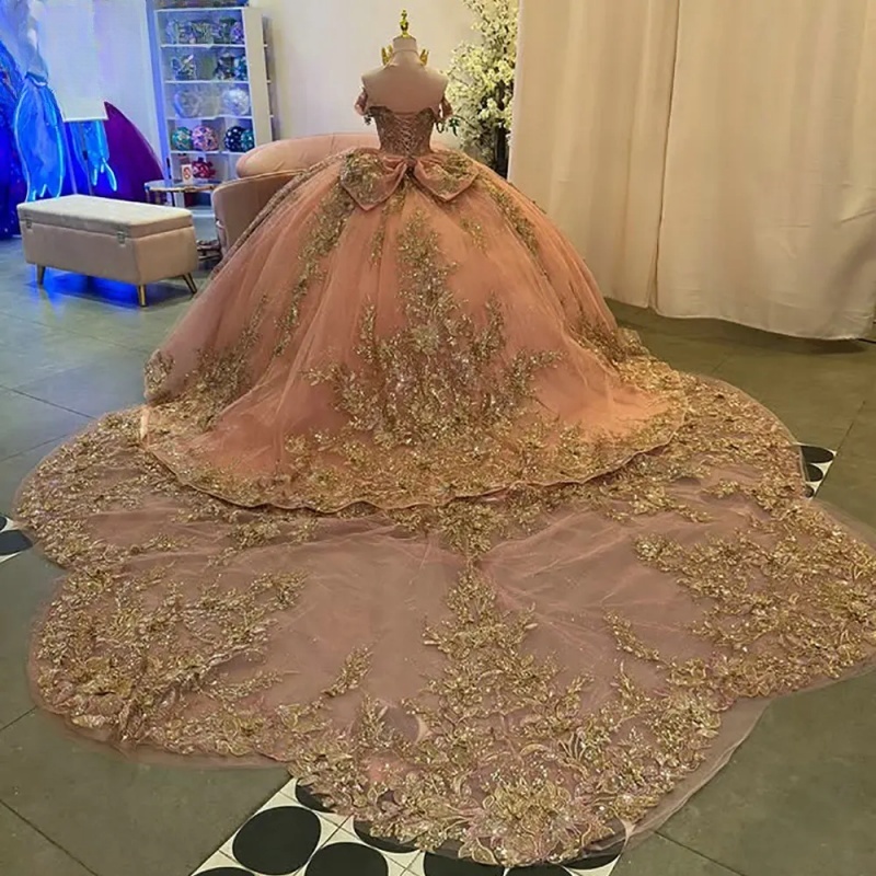 Pink Off The Shoulder Quinceanera Dresses Ball Gown Gold Appliques Lace Beading Bow Tull Sweet 15 Anos Mexican Sweet 16 Dress