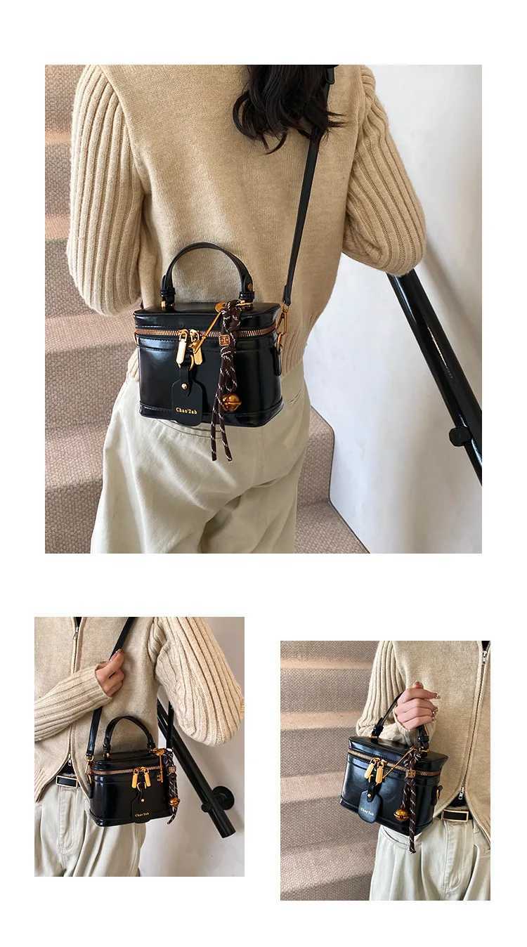 Luxury designer oil PU leather womens handbag retro cross shaped bag bucket handbag Y250324