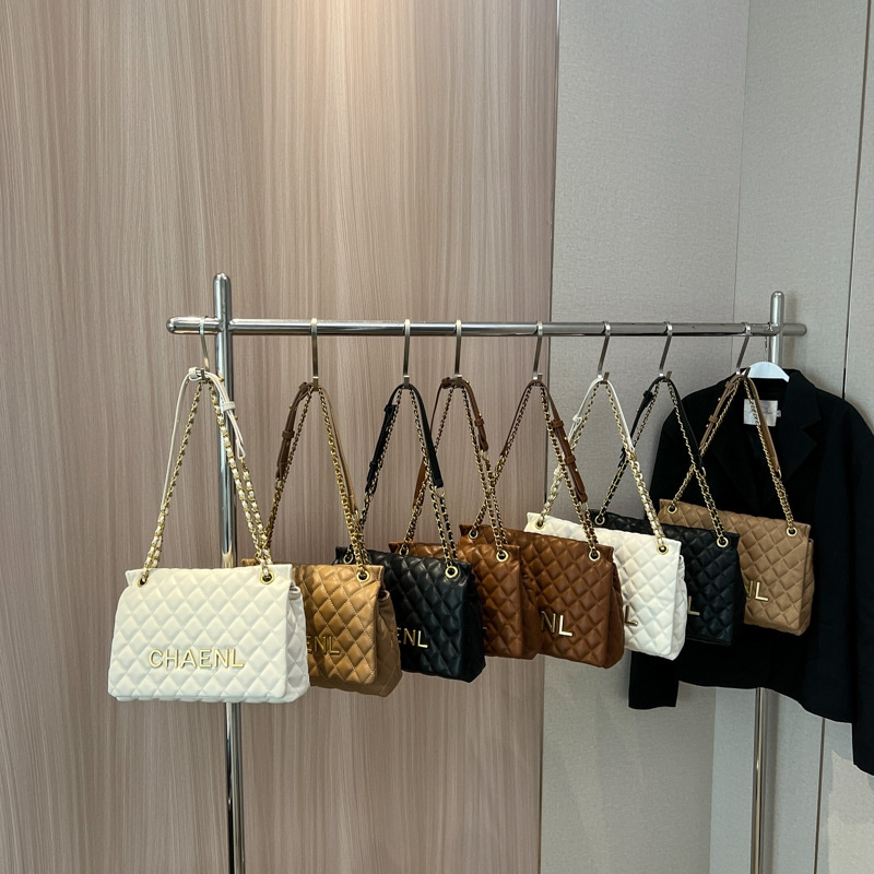 Free shipping 2025 designer fashionable and casual travel letter chain hand-held shoulder bag daily matching for women