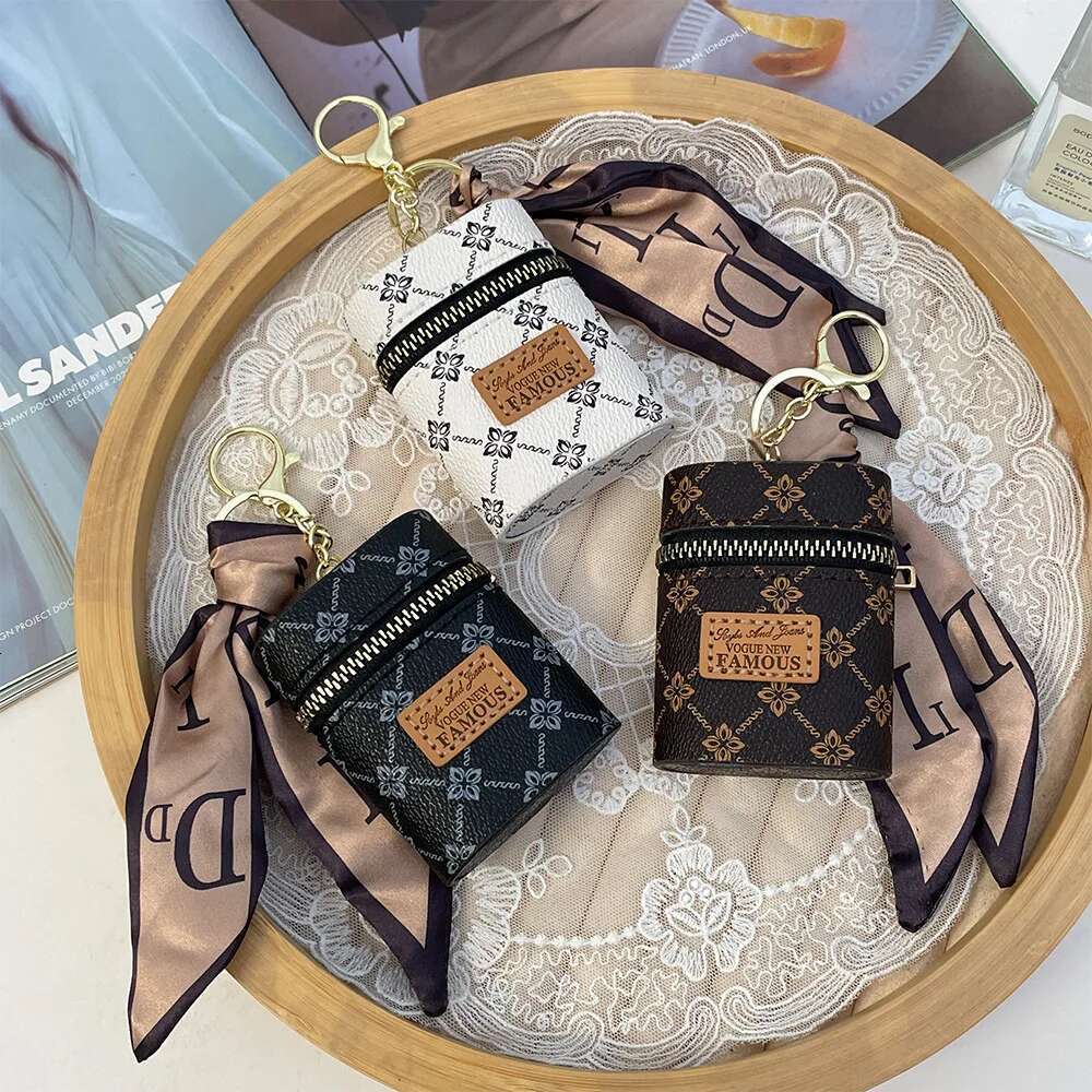 2025 New Designer Bag Women's Light Luxury Leather Oval Mouth Red Envelope Keychain Charm Ribbon Coin Wallet Pendant Girl Keychain Cute Keychain 