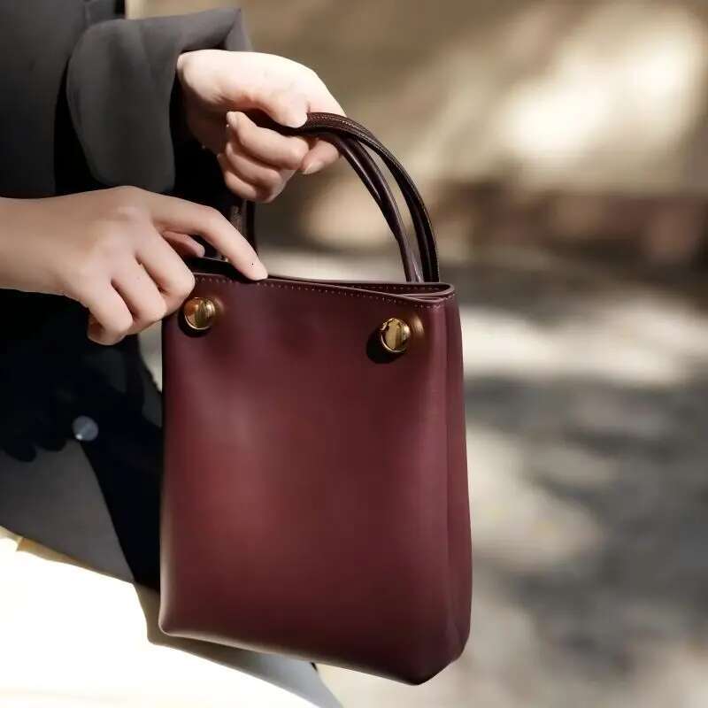 Brand Cowhide Crossbody Bucket Women's 2025 Spring New Magnetic Buckle Portable Handbag Ladies Simple Style Evening Bag