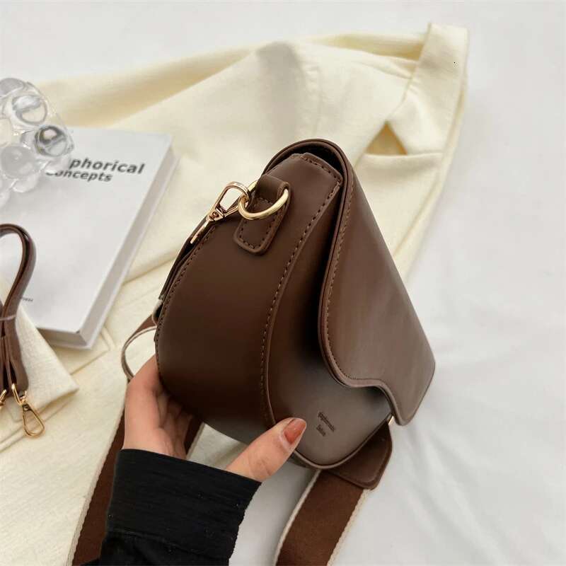 Women's Retro Solid Color Flip Ponytail Saddle Shoulder And Armpit Fashionable Designer Handbag PU Leather Wide Shoulder Strap Crossbody Bag