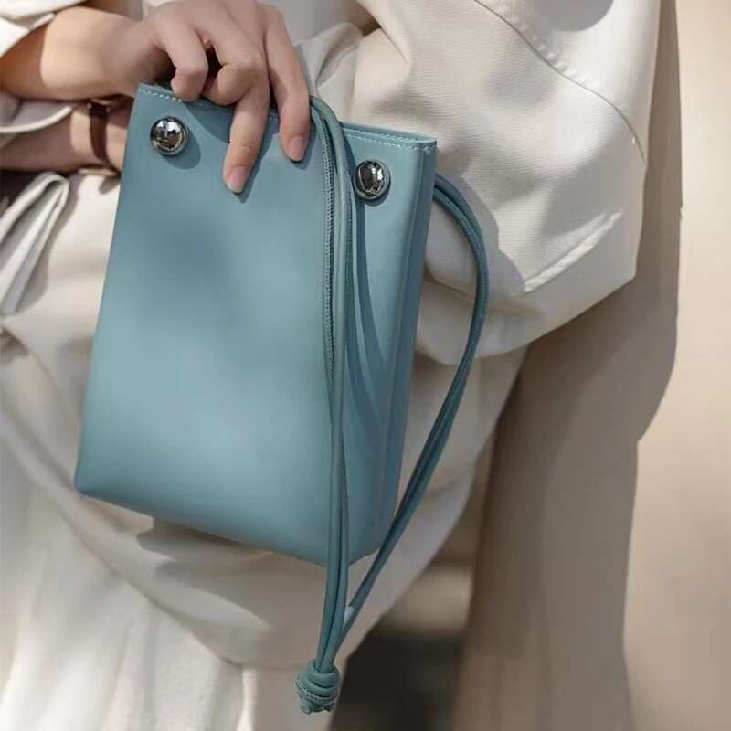 Brand Cowhide Crossbody Bucket Women's 2025 Spring New Magnetic Buckle Portable Handbag Ladies Simple Style Evening Bag