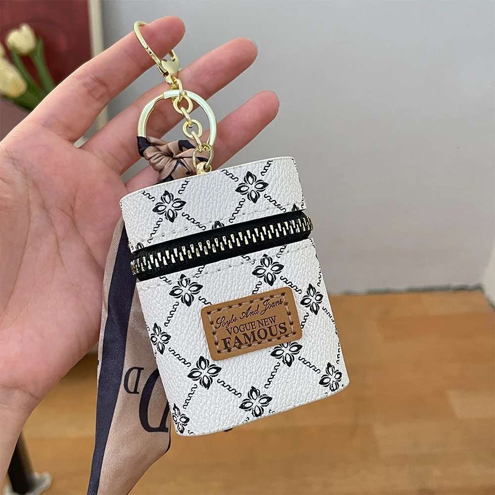 2025 New Designer Bag Women's Light Luxury Leather Oval Mouth Red Envelope Keychain Charm Ribbon Coin Wallet Pendant Girl Keychain Cute Keychain 