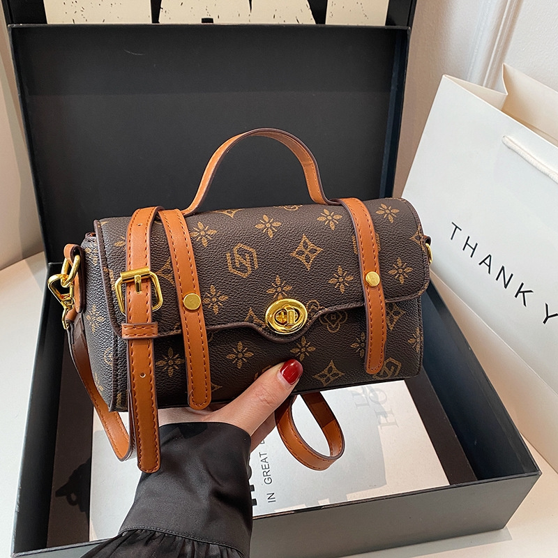 Free shipping 2025 new designer bag Fashion commute Printed temperament single shoulder crossbody bag Handheld for women