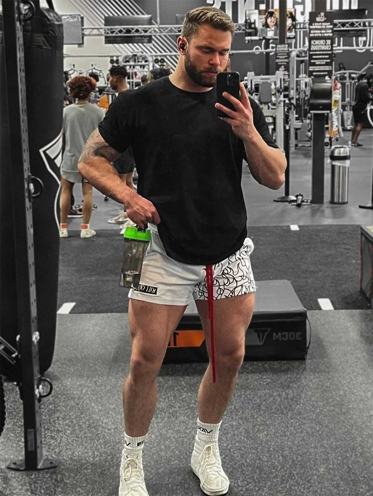 Quick drying running shorts for mens summer gym fitness bodybuilding breathable mesh Bermuda boxing training mens beach pants Ee W250324