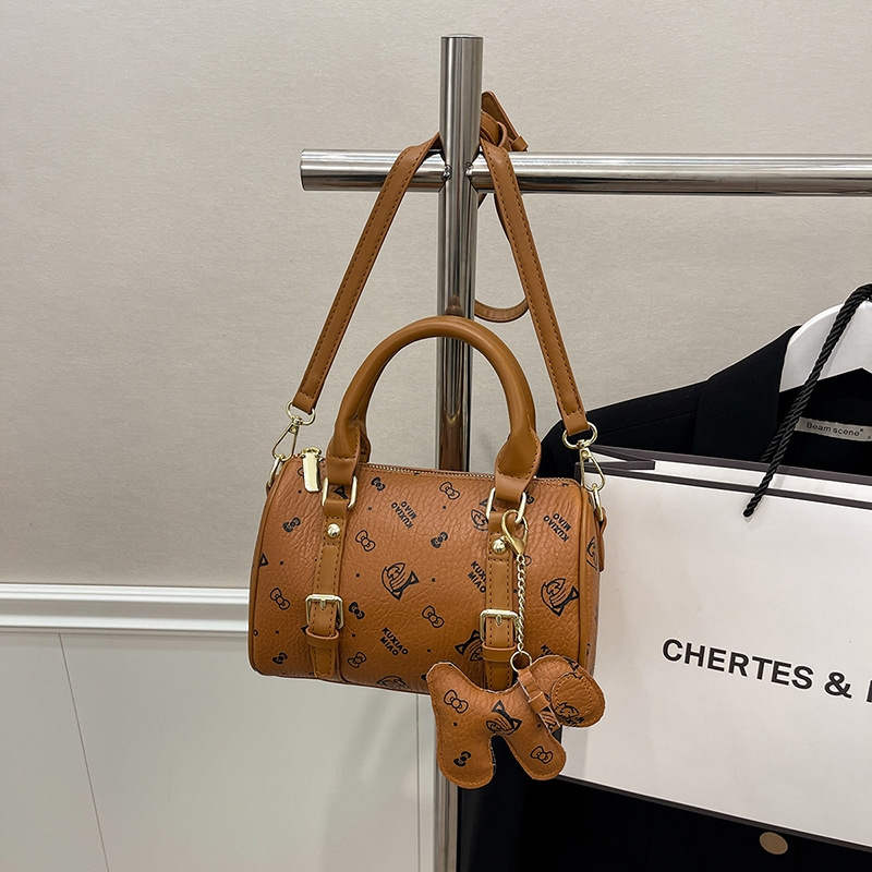 Free shipping 2025 new designer bag, fashionable commuting dog decoration pillow bag, hand-held single shoulder diagonal cross bag