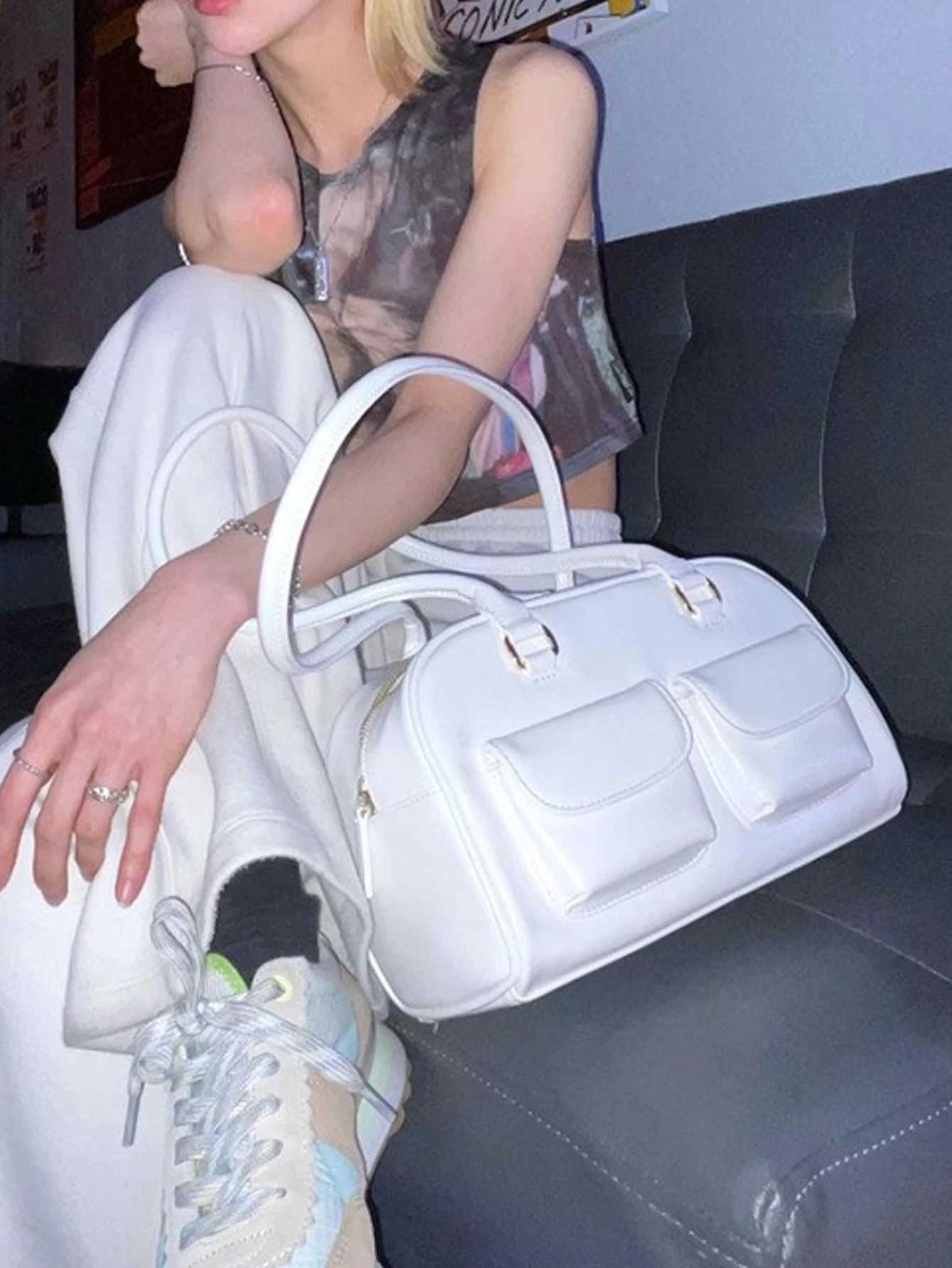 Top Quality Brand High Quality New Style Free Delivery Designer Bag Korean Dizzy Needle Heo Yoon Zhen Same Oil Wax Leather Bowling Bag Multi Pocket Bo