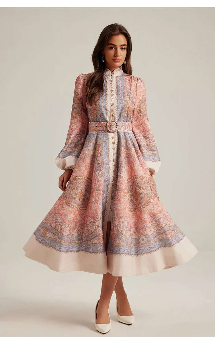 In 2025, stand - collar single -breasted printed vintage with belt. It's a mid -length dress suitable for vacation style ddmySept