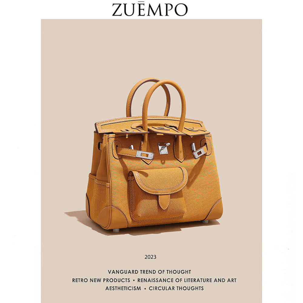 Women's Bags Small niche design cargo bag women's canvas patchwork color genuine leather 25cm handle handbag