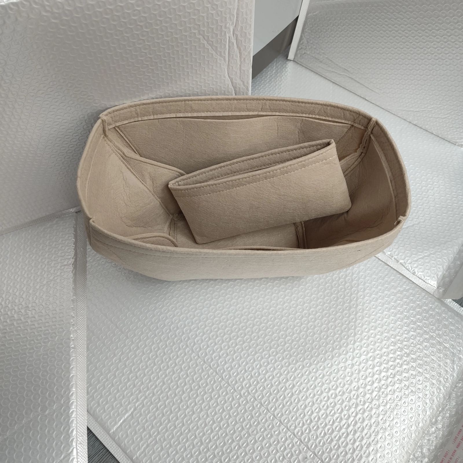 Bag style storage bag and organization to maintain shape lined with wallet bag style organizer inserted for bicycles and mini handbags for bicycles 25