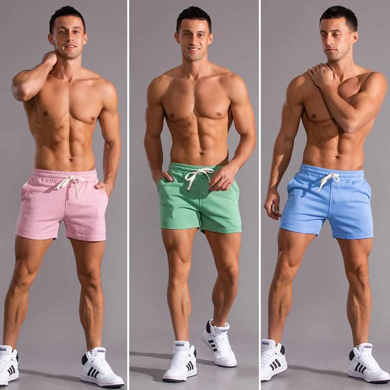 Summer running shorts mens quick drying gym running shorts beach pocket fitness shorts mens branded fitness clothing W250324