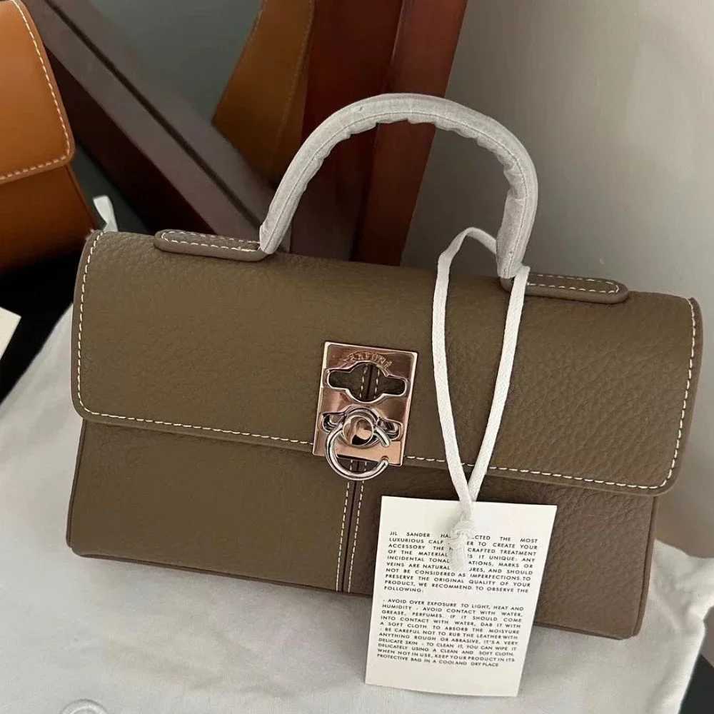 Vintage leather bag light niche small square bag French ten letter handbag Communicating womens bag designer bag Z250324