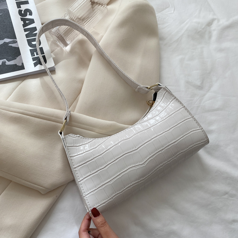 Women's shoulder bag embossed underarm bag Summer trend new stone candy colored hand 2025s hot