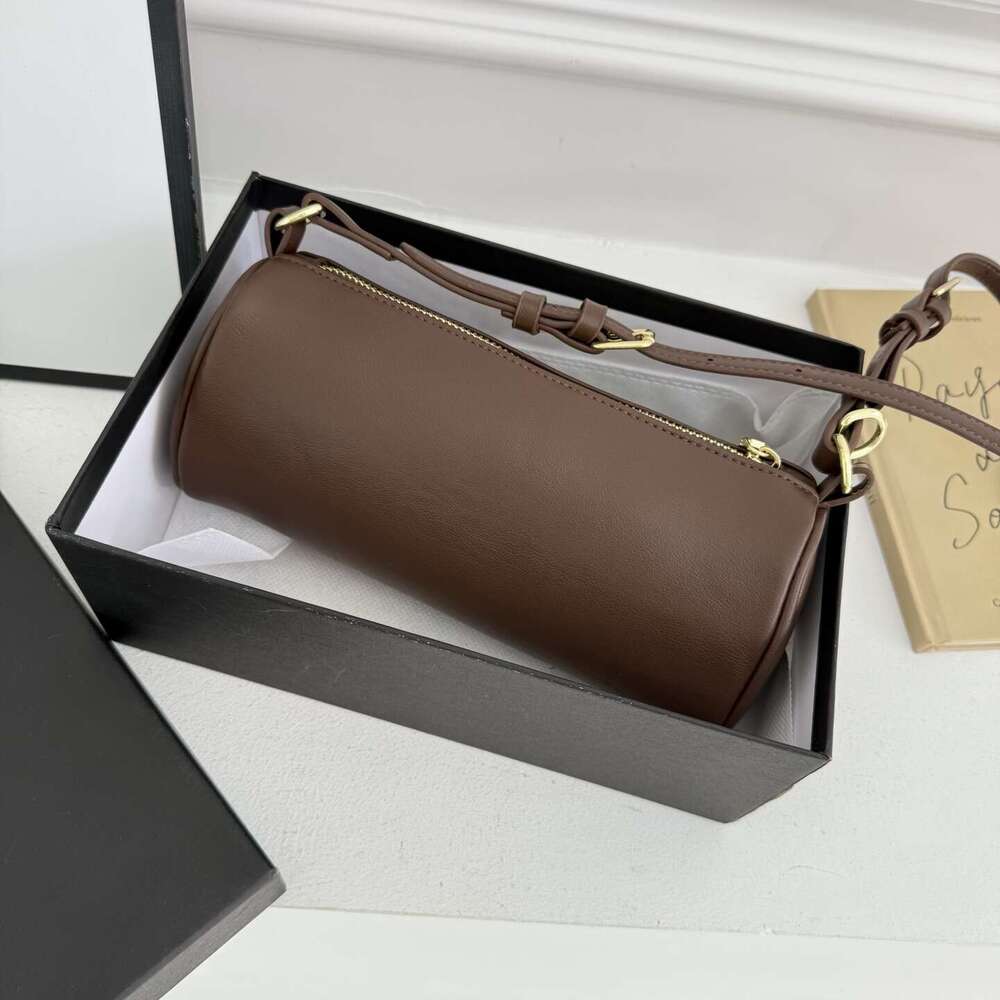 Wholesale of new trendy women's bags with cylindrical bags, single shoulder crossbody bags, top layer cowhide pen holder bags