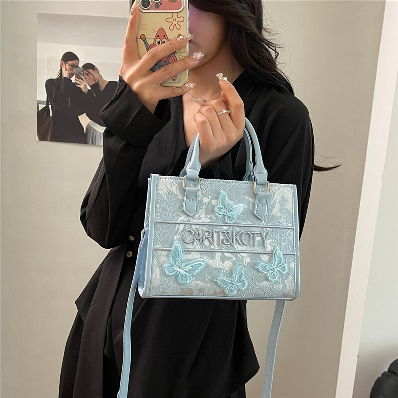 Fashion Bow Embroidery Handbag 2025 New Designer Bag High Quality Texture Large Capacity Commuter Bag Handbag Outdoor Leisure Bag Light Luxury Style F