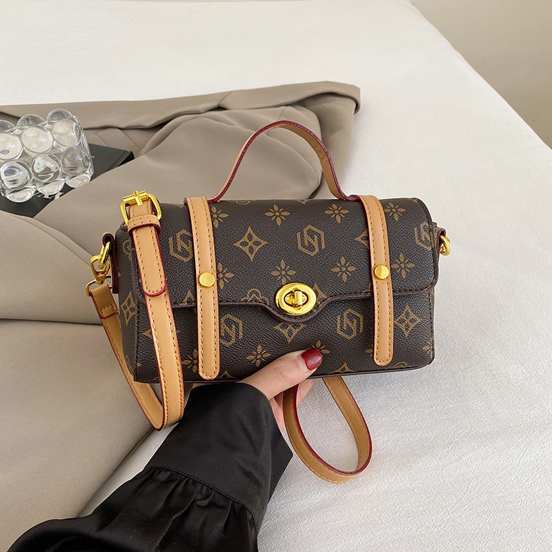 Free shipping 2025 new designer bag Fashion commute Printed temperament single shoulder crossbody bag Handheld for women