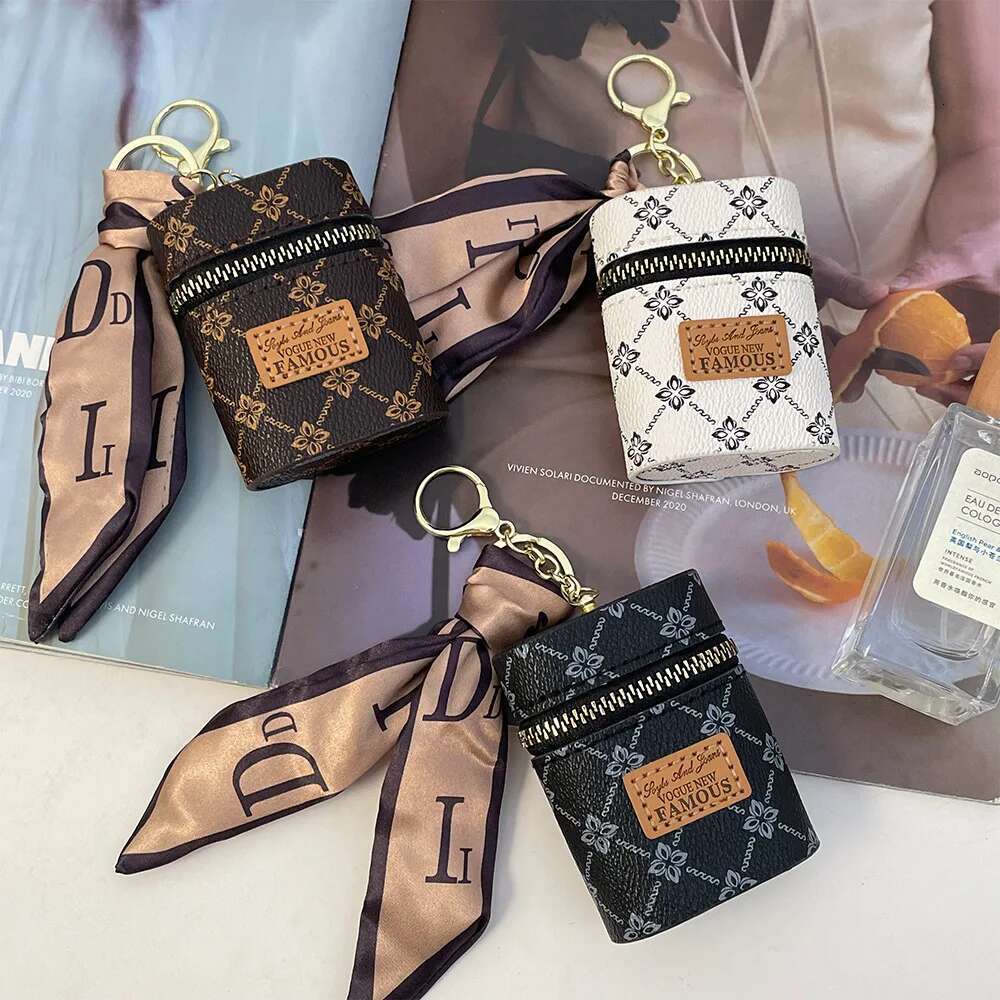 2025 New Designer Bag Women's Light Luxury Leather Oval Mouth Red Envelope Keychain Charm Ribbon Coin Wallet Pendant Girl Keychain Cute Keychain 