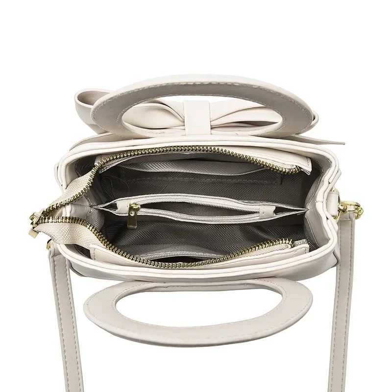 Fashionable casual womens handbag cute bow black and white blue Kahki PU handbag fashionable daily shoulder bag bolsa feminina Z250324