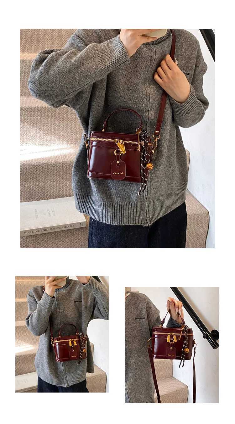Luxury designer oil PU leather womens handbag retro cross shaped bag bucket handbag Y250324