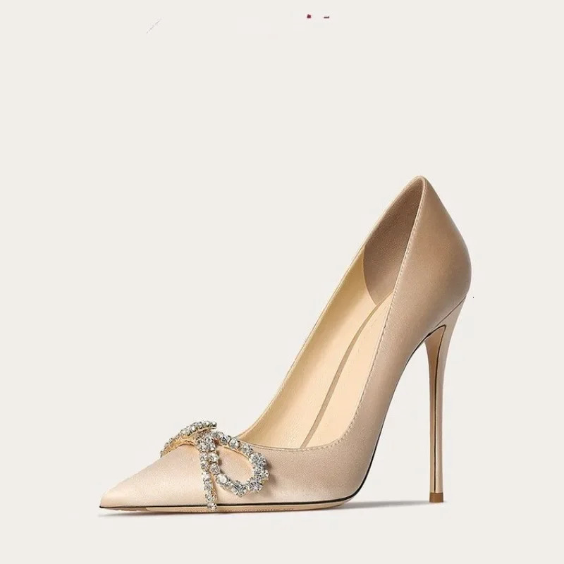 -selling solid color womens shoes for featuring angular toes and slim heels as well as rhinestone bow decorated ski boots 250318