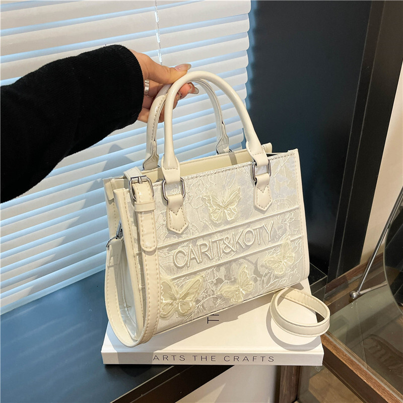 Fashion Bow Embroidery Handbag 2025 New Designer Bag High Quality Texture Large Capacity Commuter Bag Handbag Outdoor Leisure Bag Light Luxury Style F