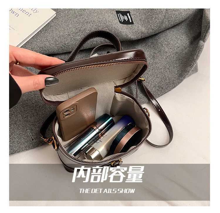 Luxury designer oil PU leather womens handbag retro cross shaped bag bucket handbag Y250324