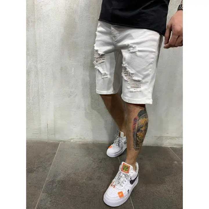 2024 Ripped tassel denim shorts New Summer Mens Personalized Washable Perforated Denim Pants Large Casual Middle Pants T250603