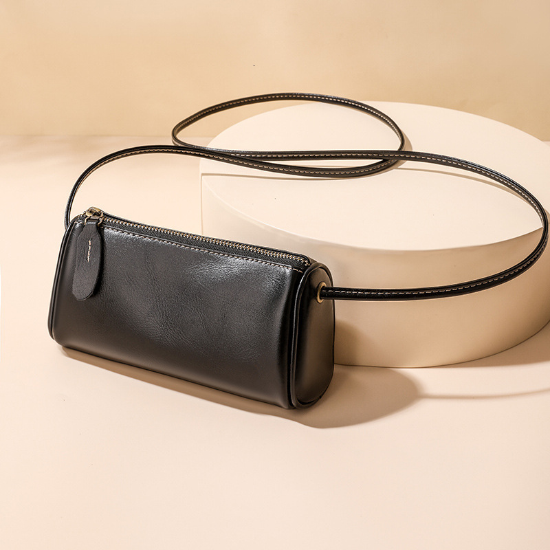 Designer 2025S genuine women spring new lightweight crossbody small oil wax soft cow leather feeling mini phone pillow bag