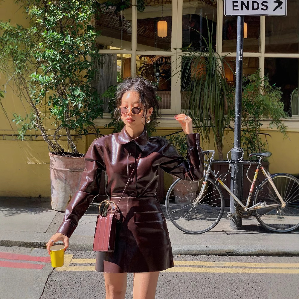 Women's collar button PU jacket mini skirt two-piece set