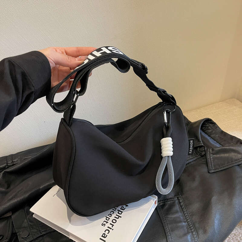 2d Waterproof Oxford cloth large capacity dumpling with crossbody for female niche new versatile casual sports style shoulder bag trend