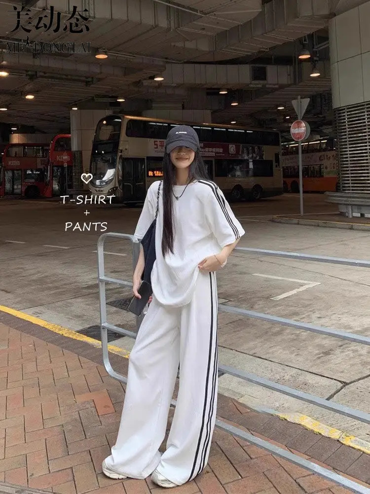 Spring and summer loose casual suit womens striped short sleeved T-shirt wearing floor sweeping wide leg pants two-piece set 250320
