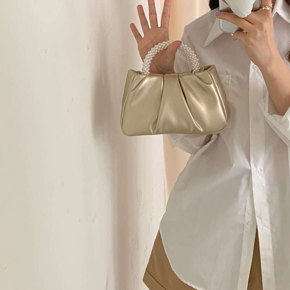 French pleated 2025 high-end feeling fairy like pearl small handbag gentle wind crossbody cloud bag for women
