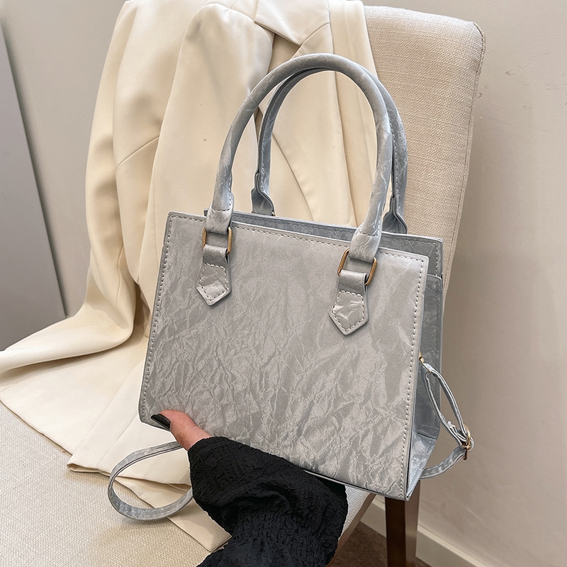 Hot selling fashion niche design folding small square handbag vintage fashion texture single shoulder crossbody bag