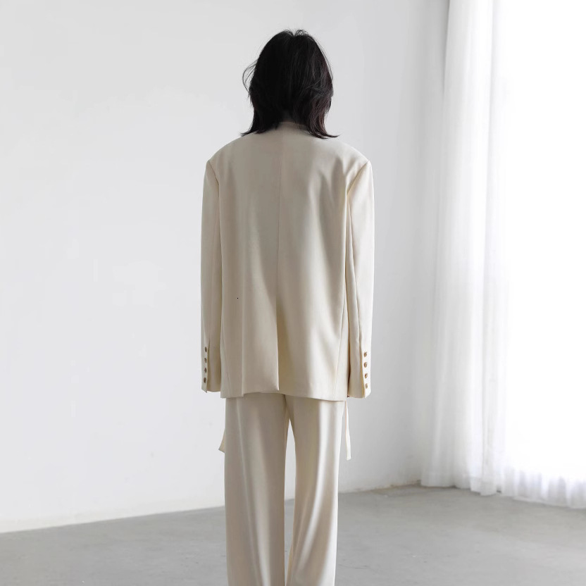 2025 high-end design sense niche wide shoulder ribbon mid length drape white jacket women's black spring and autumn suit