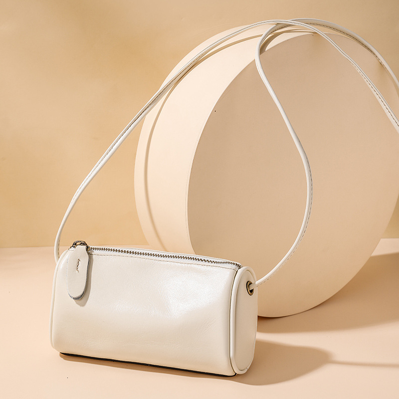 Designer 2025S genuine women spring new lightweight crossbody small oil wax soft cow leather feeling mini phone pillow bag