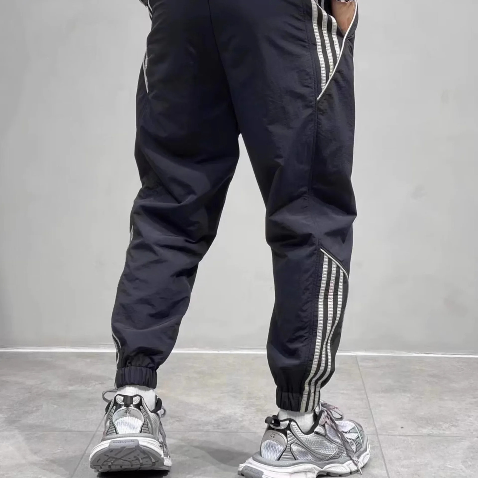 American style outdoor functional waterproof climbing pants for men spring and autumn loose casual pants 250321