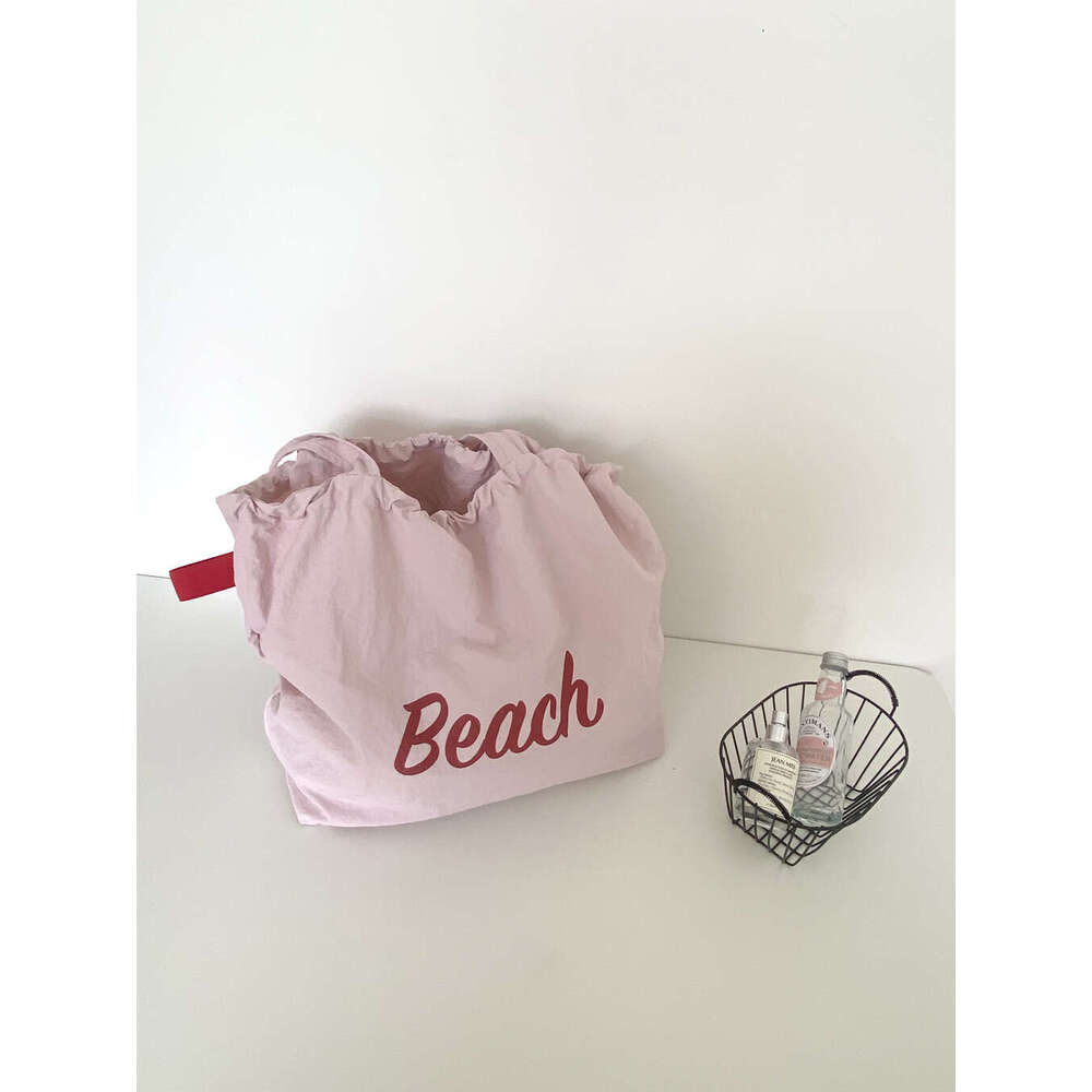 Korean version new letter printed women's large capacity nylon shoulder casual versatile portable drawstring tote bag