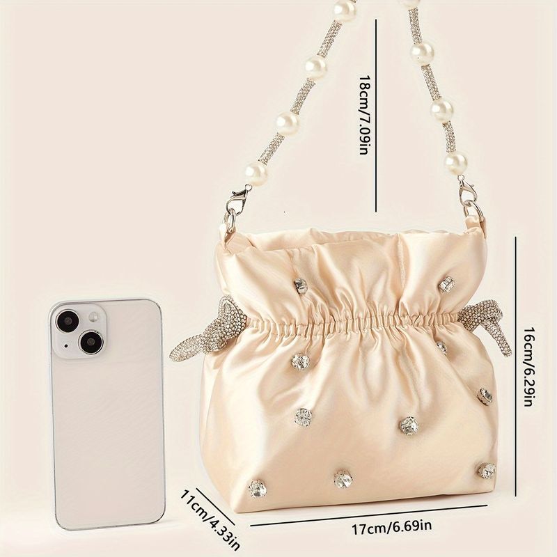 Elegant Solid Color Clutch With Rhie Accents And Pearl Handle